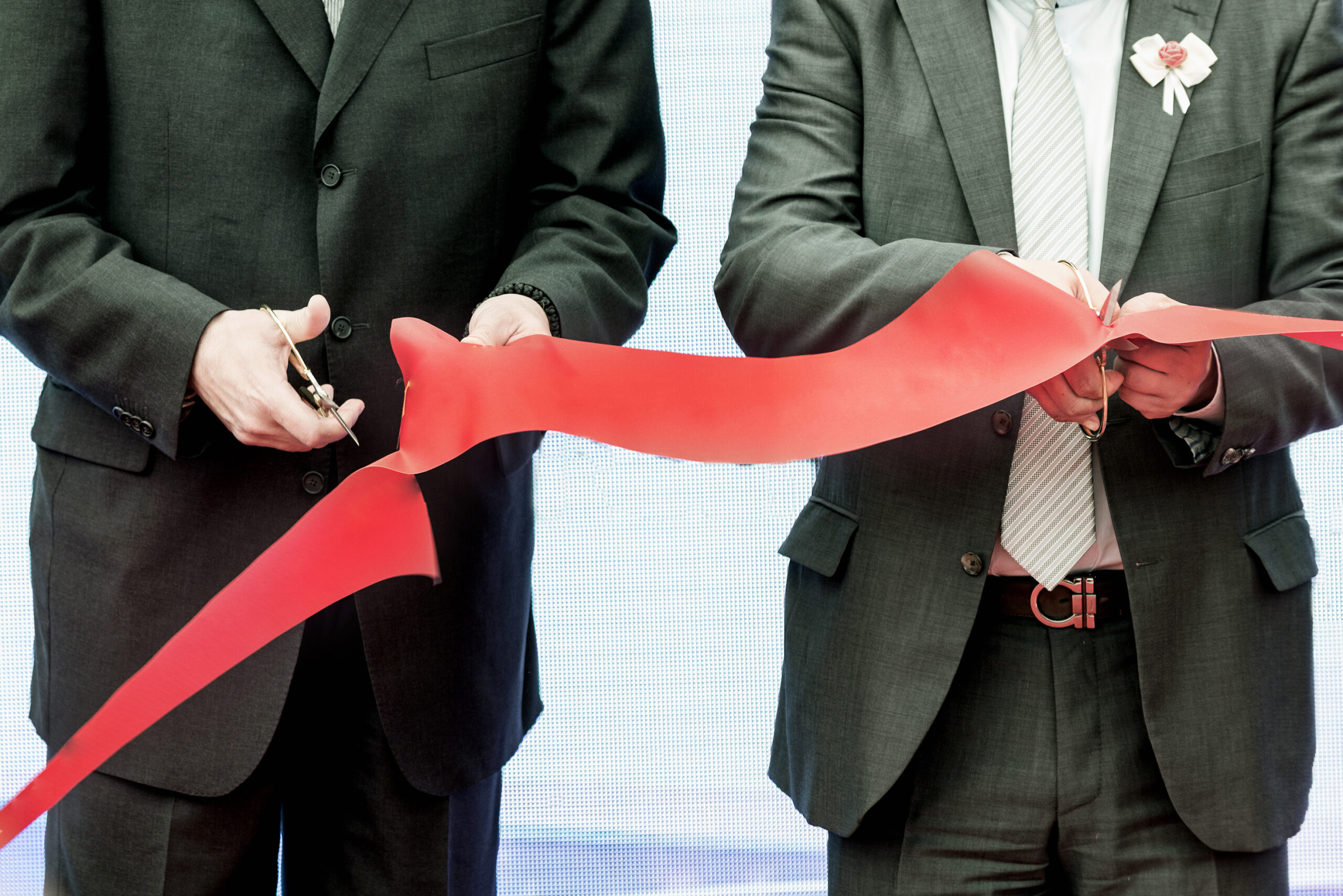 Business people on Ribbon cutting ceremony